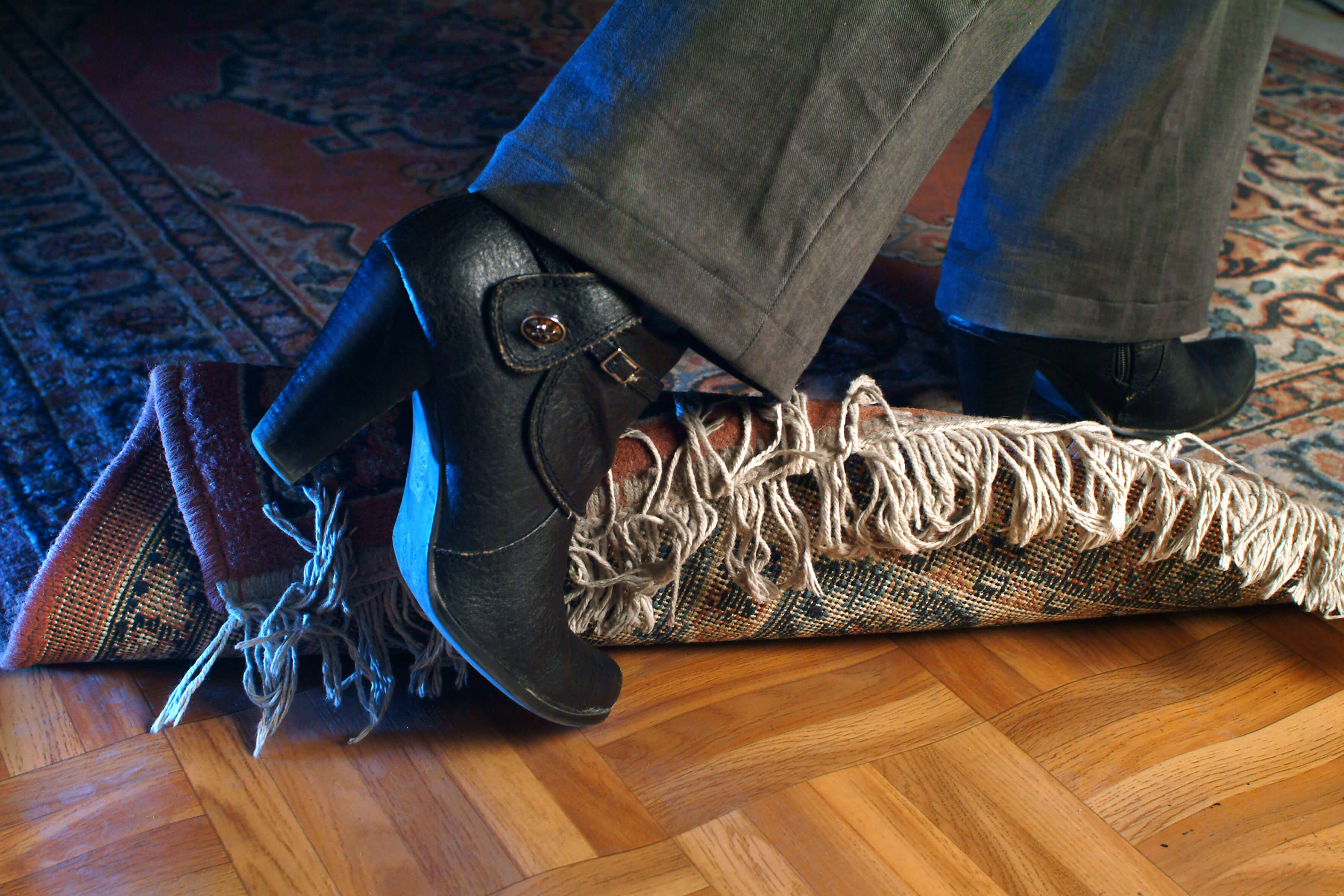 Foot tripping over rug