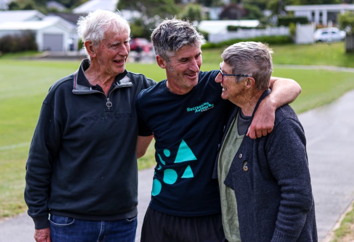 Andrew embraces his parents