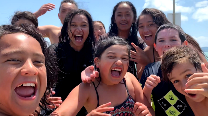 Children having a selfie at the beach