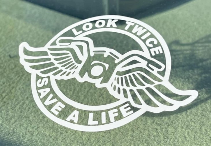 The sticker created by Kavana Jane saying 'Look twice, save a life'.