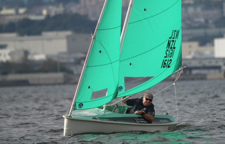 Brendan on the water in his modified sailing boat.