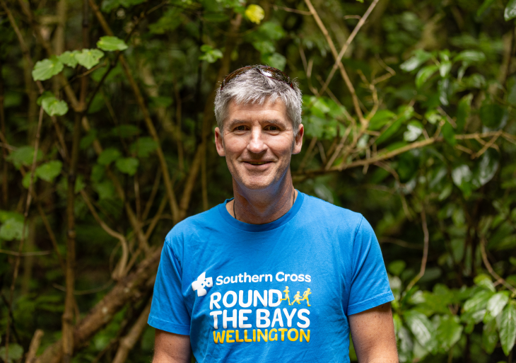 A close-up portrait photo of Andrew Leslie smiling. 