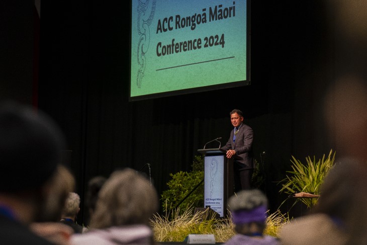Rēnata Blair, Deputy Chief Executive Māori for ACC, speaking on stage at the ACC Rongoā Māori Confer